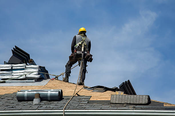 Professional Metal Roofing technician working in Lexington, IL